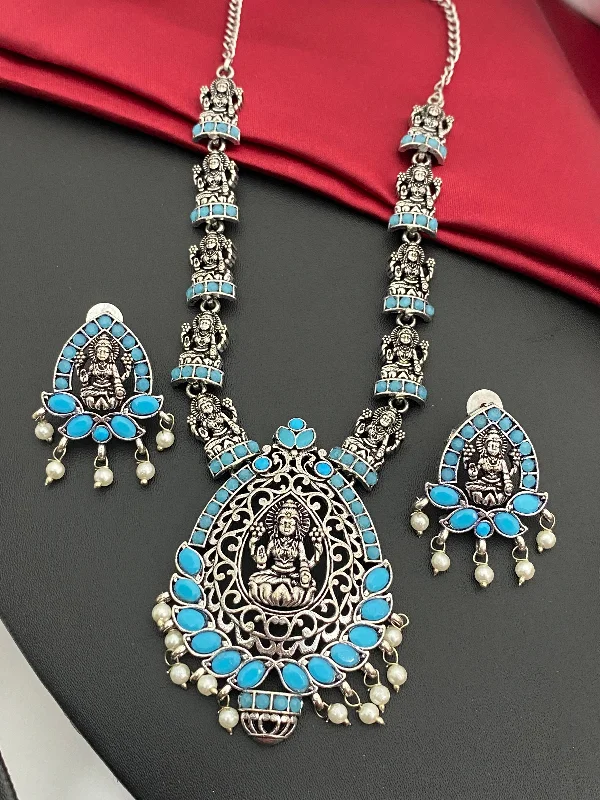 Natural Stone Pendant Necklace-Sizzling Blue Stone Studded Lakshmi Pendant Temple Jewelry Necklace Set With Earrings